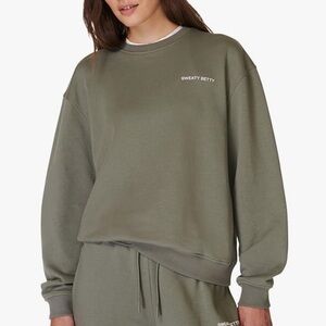 Sweaty Betty ‘Our Strength Is In Each Other” Fleece Sweatshirt Green, S/M NWT